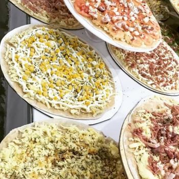 Foto Magníficos Pizza