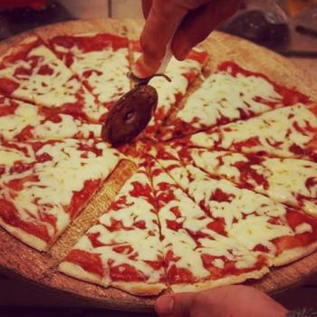 Foto Magníficos Pizza